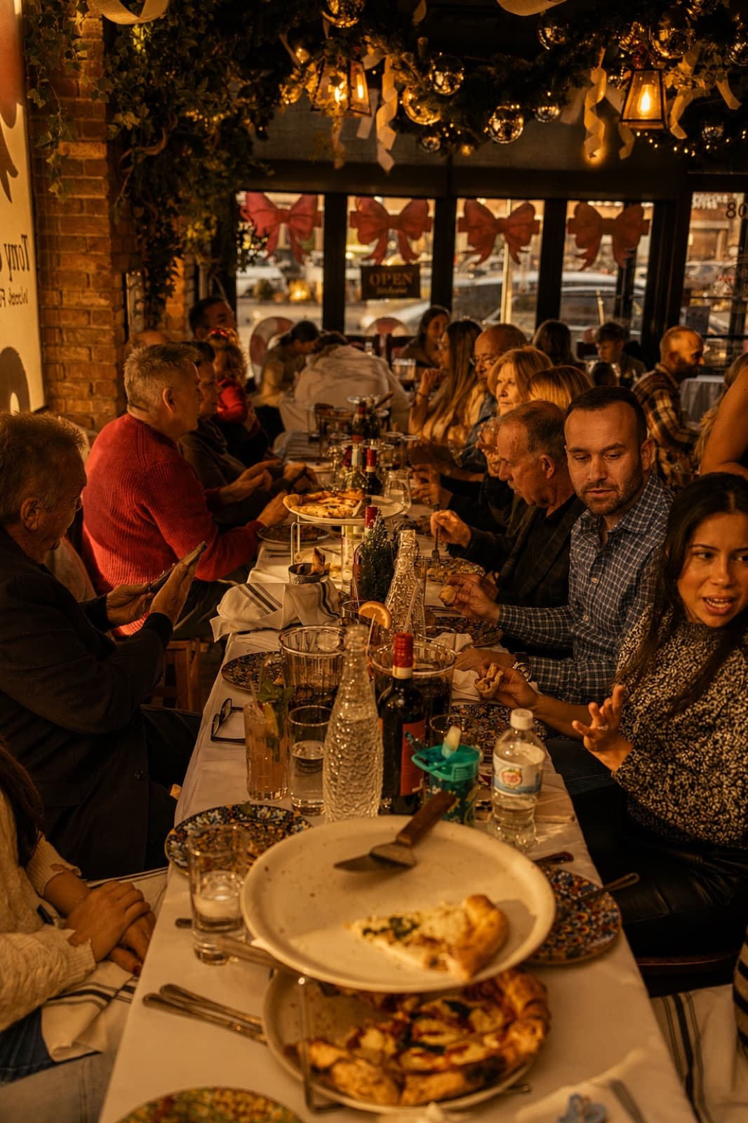 Festive holiday long table with pizza